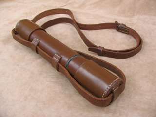 Vintage field telescope with shoulder carry strap