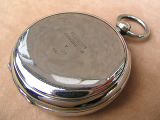 Top view of closed compass with makers marks