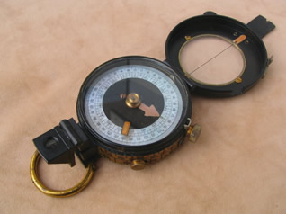 MKIX prismatic marching compass by E R Watts & Son, 1935