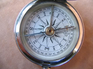 Close up view of dial showing jewelled needle