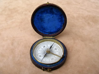 Victorian pocket compass in leather covered case