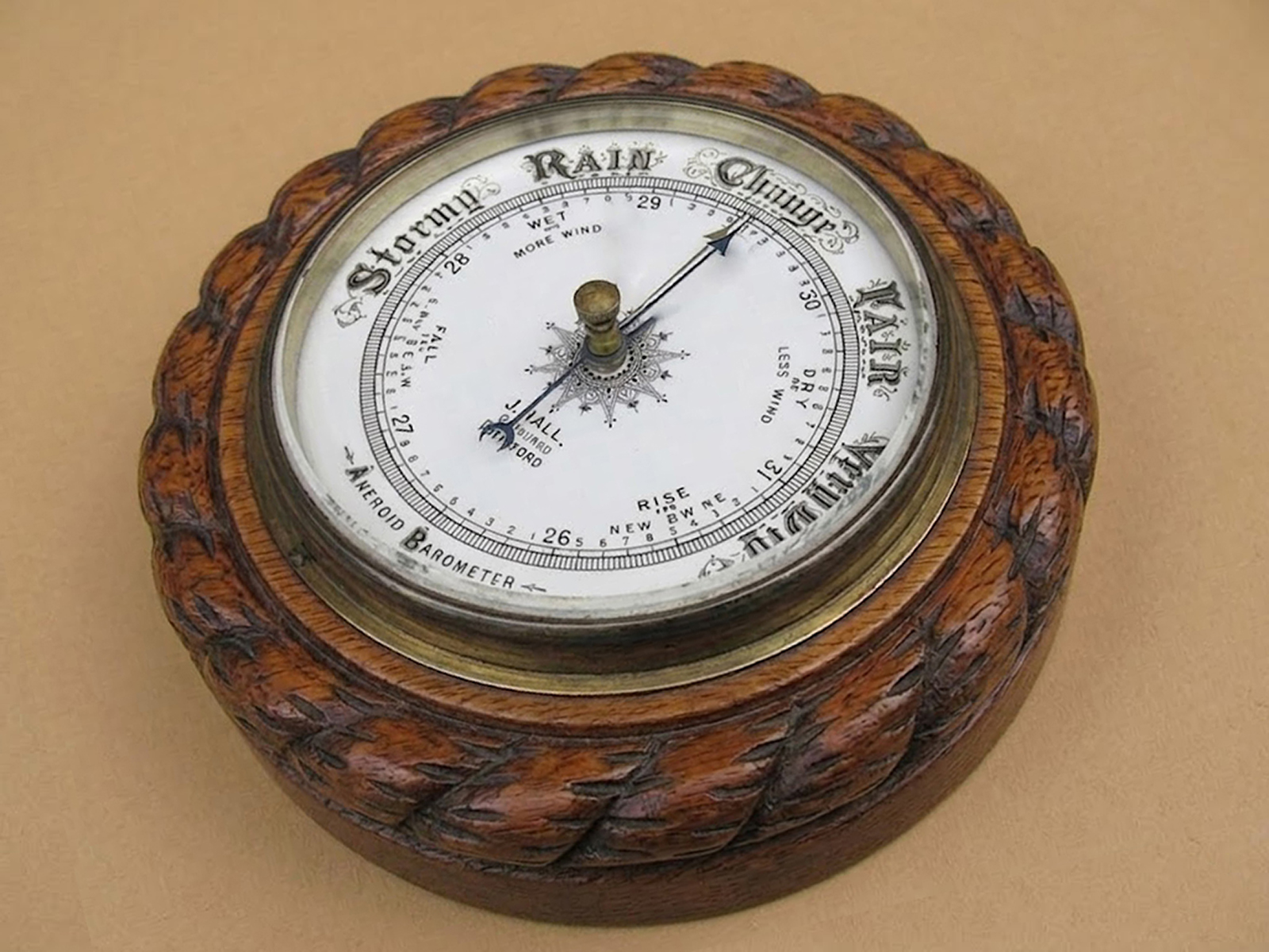 Oak aneroid barometer by J Hall Opticians, Bradford