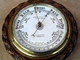 Victorian aneroid barometer with curved thermometer